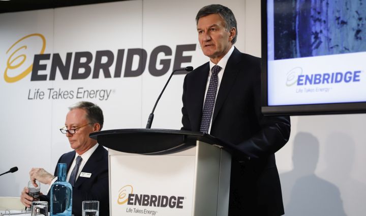 Enbridge president and CEO Al Monaco, right, addresses the company's annual meeting in Calgary, Wednesday, May 8, 2019.