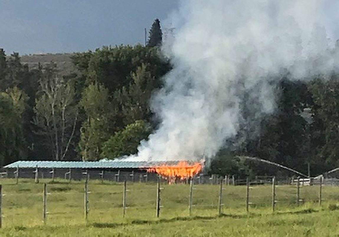 A barn was damaged by fire .