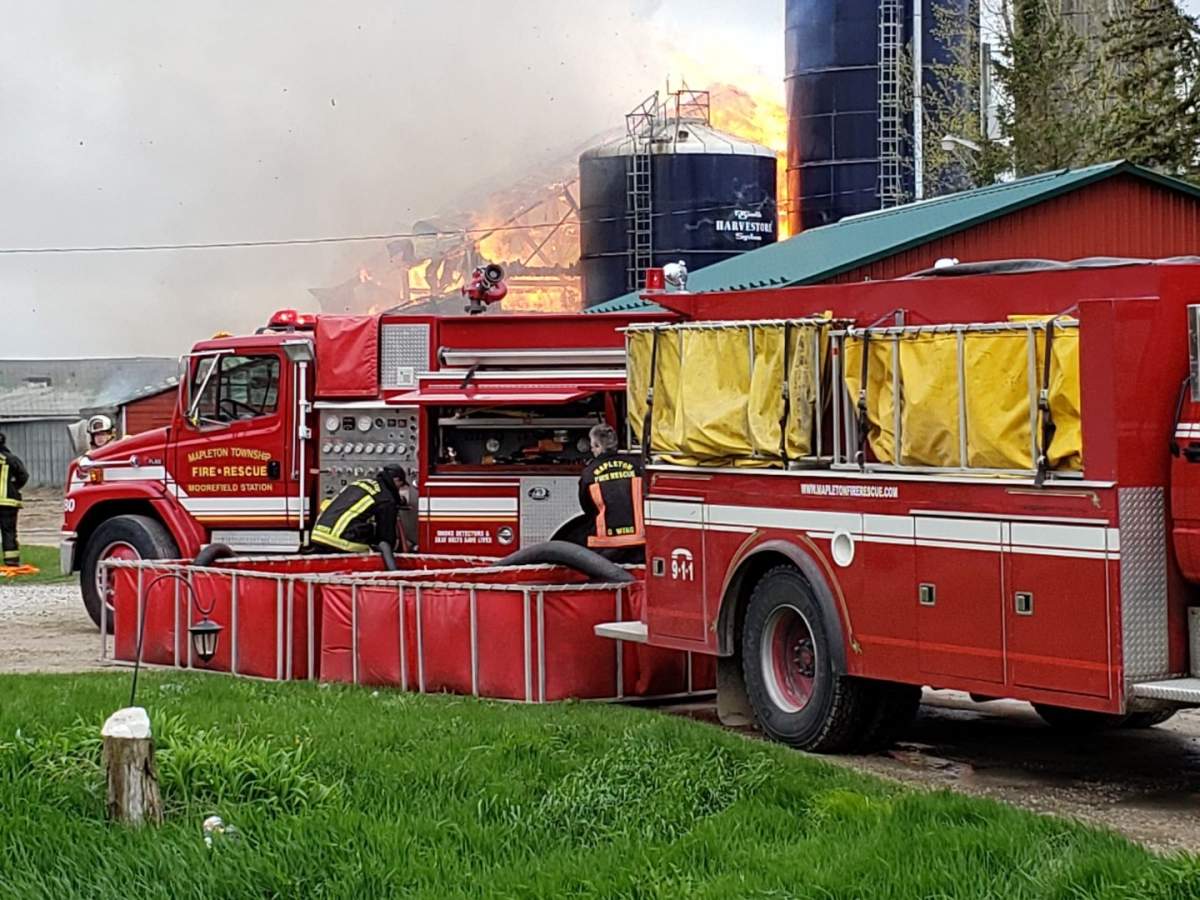 Firefighters found the barn fully engulfed in flames.