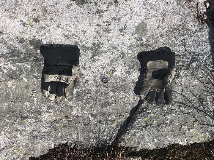 A photo of a man’s lost wedding ring that was found at Big White on May 23. The man lost it while skiing in late January. A Big White millworker found the ring. Beside the ring are the millworker’s gloves.