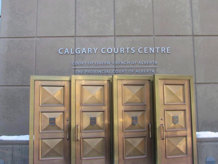 A file photo of a sign at the Calgary Courts Centre in Calgary.