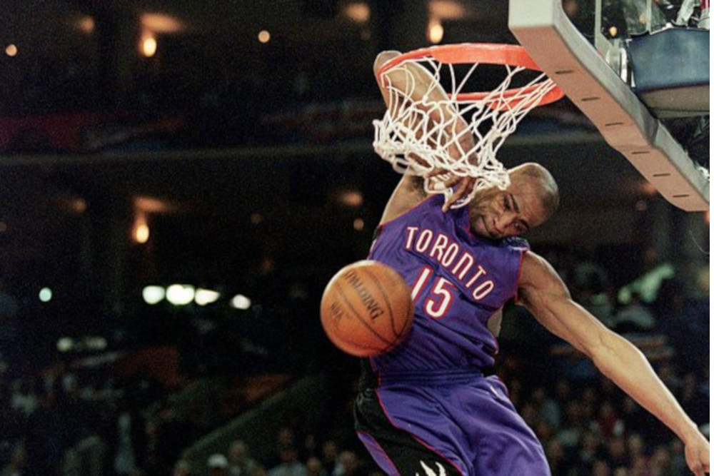 Vince Carter of the Toronto Raptors jumps to make the slam dunk during the NBA Allstar Game Slam Dunk Contest at the Oakland Coliseum in Oakland, California.