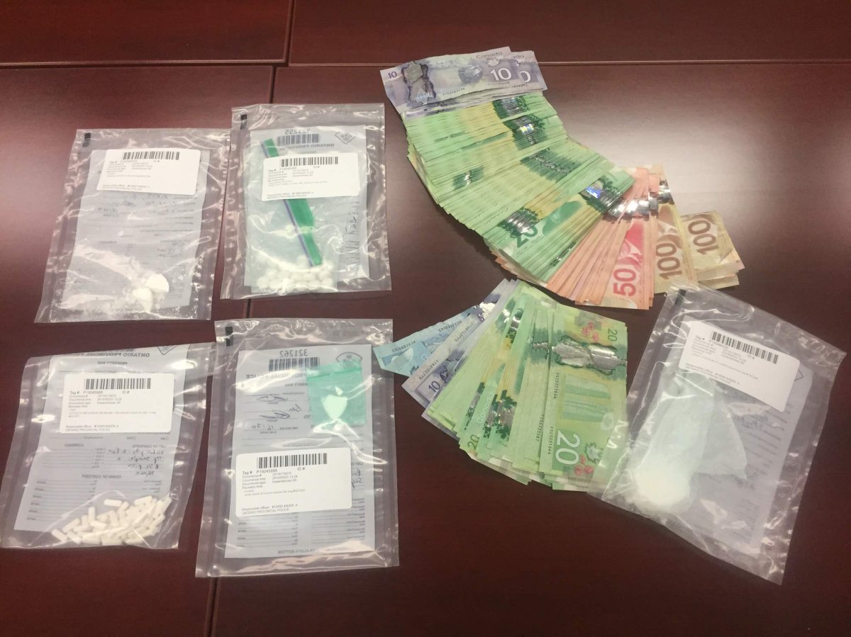 Peterborough County OPP seized cocaine, oxycodone and cash during a vehicle stop Friday in Cavan Monaghan Township.