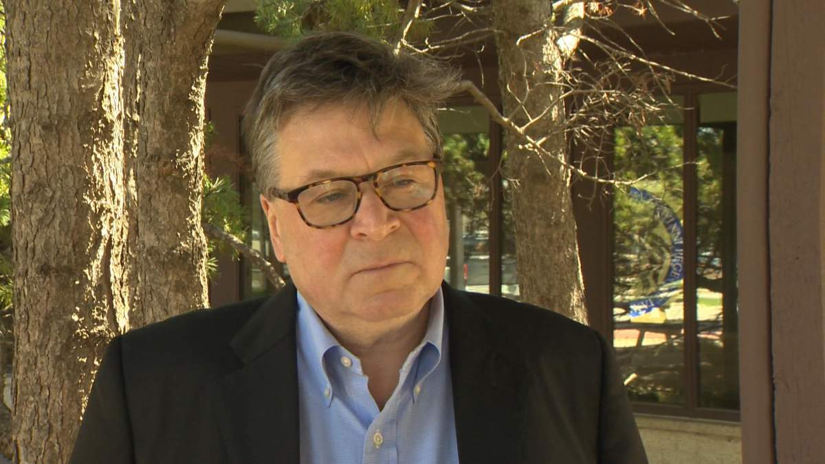 Dr. Christopher Adams, a political science professor at the University of Manitoba.