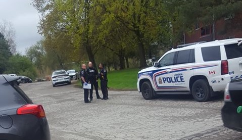There were upwards of a dozen police cars surrounding 165 Connaught Avenue Monday afternoon, according to a citizen reporter.