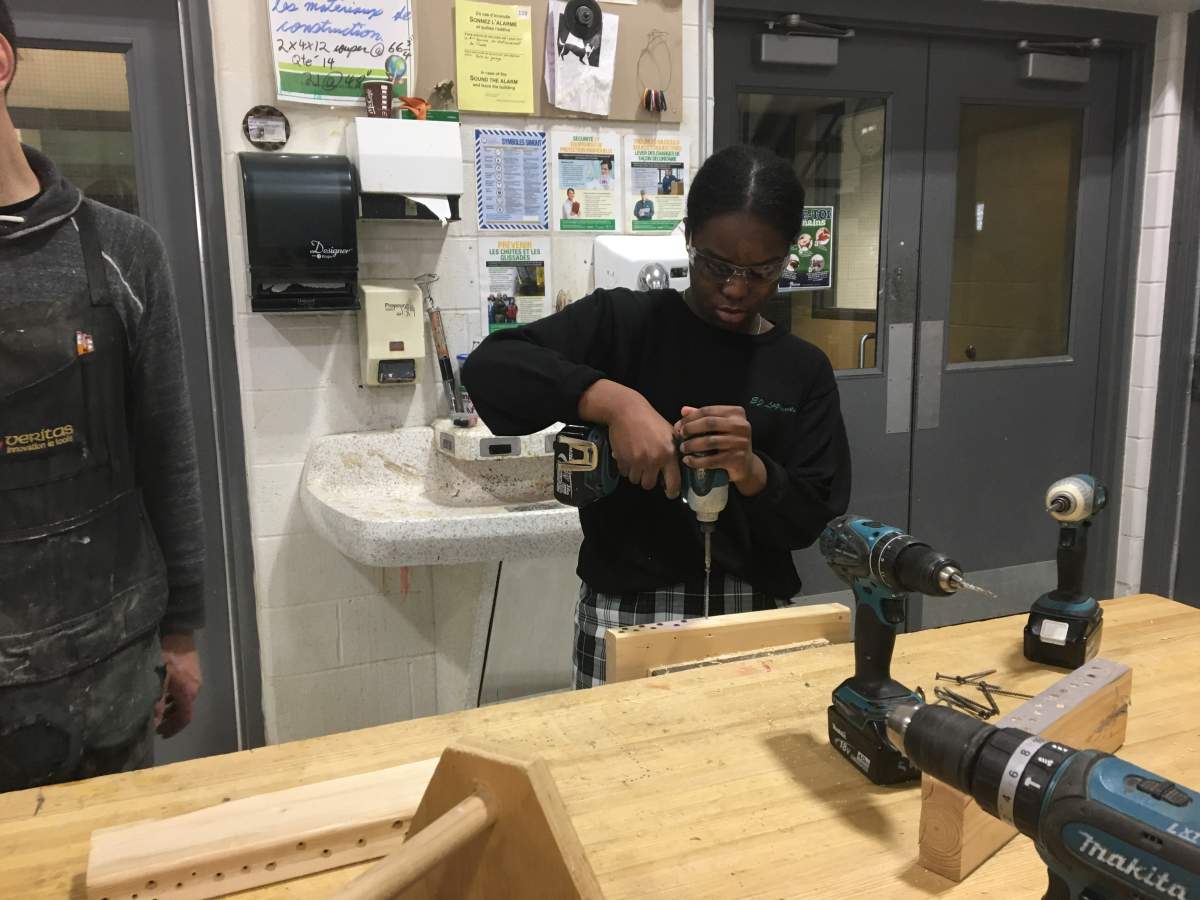 A student participates in the home maintenance workshop, as part of adulting courses at E.J. Lajeunesse catholic high school. 