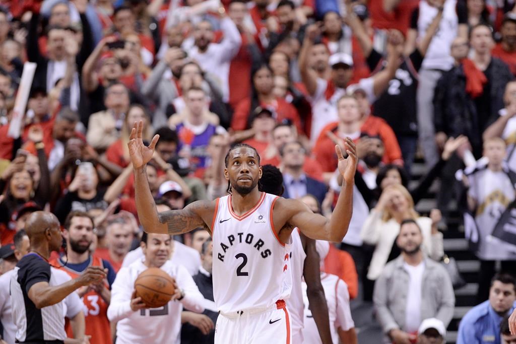 Toronto Raptors forward Kawhi Leonard (2) reacts following the Raptors win against the Milwaukee Bucks in Game 3 of the NBA Eastern Conference finals in Toronto on Sunday, May 19, 2019.