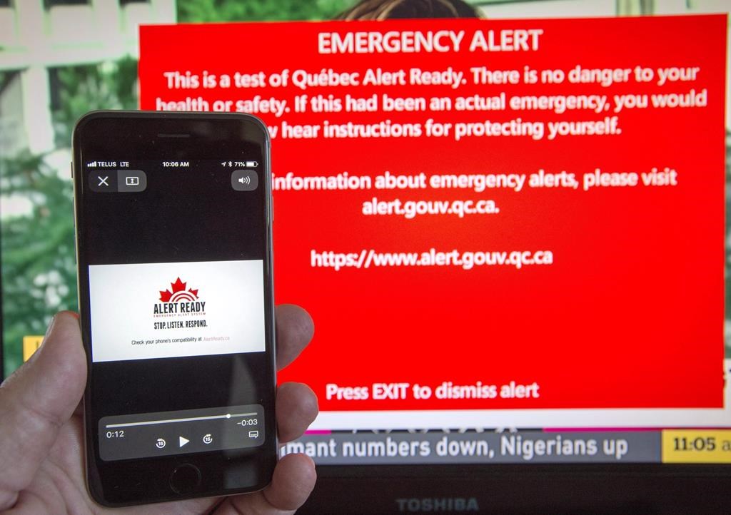 Public Safety Canada says it received notification last week from Ontario and Quebec that the provinces are opting out of the testing because neither wants to send unnecessary alert tones to residents dealing with historic flooding. A smartphone and a television receive visual and audio alerts to test Alert Ready, a national public alert system in Montreal, Monday, May 7, 2018.