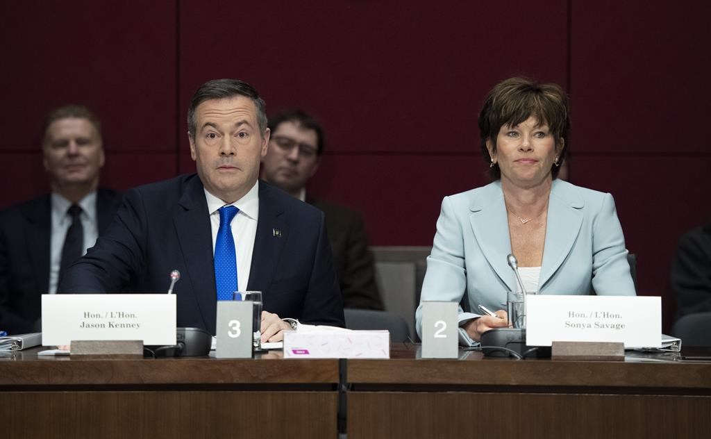 Alberta Premier Jason Kenney and Minister of Energy for Alberta Sonya Savage, right, prepare to appear at the Standing Senate Committee on Energy, the Environment and Natural Resources about Bill C-69 at the Senate of Canada Building on Parliament Hill in Ottawa on May 2, 2019.