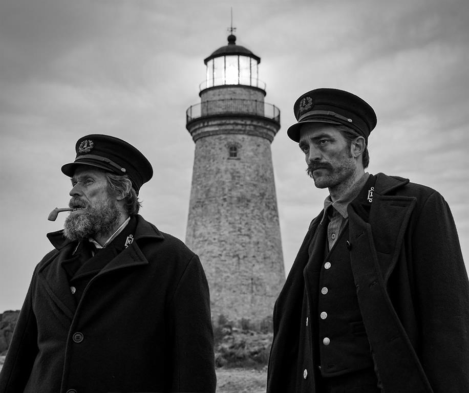Willem Dafoe and Robert Pattinson on the set of The Lighthouse in Yarmouth, N.S. in this undated handout photo.