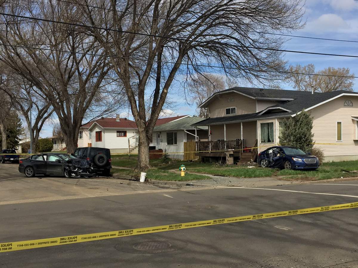 Police investigate a collision near 40 Street & 121 Avenue.
