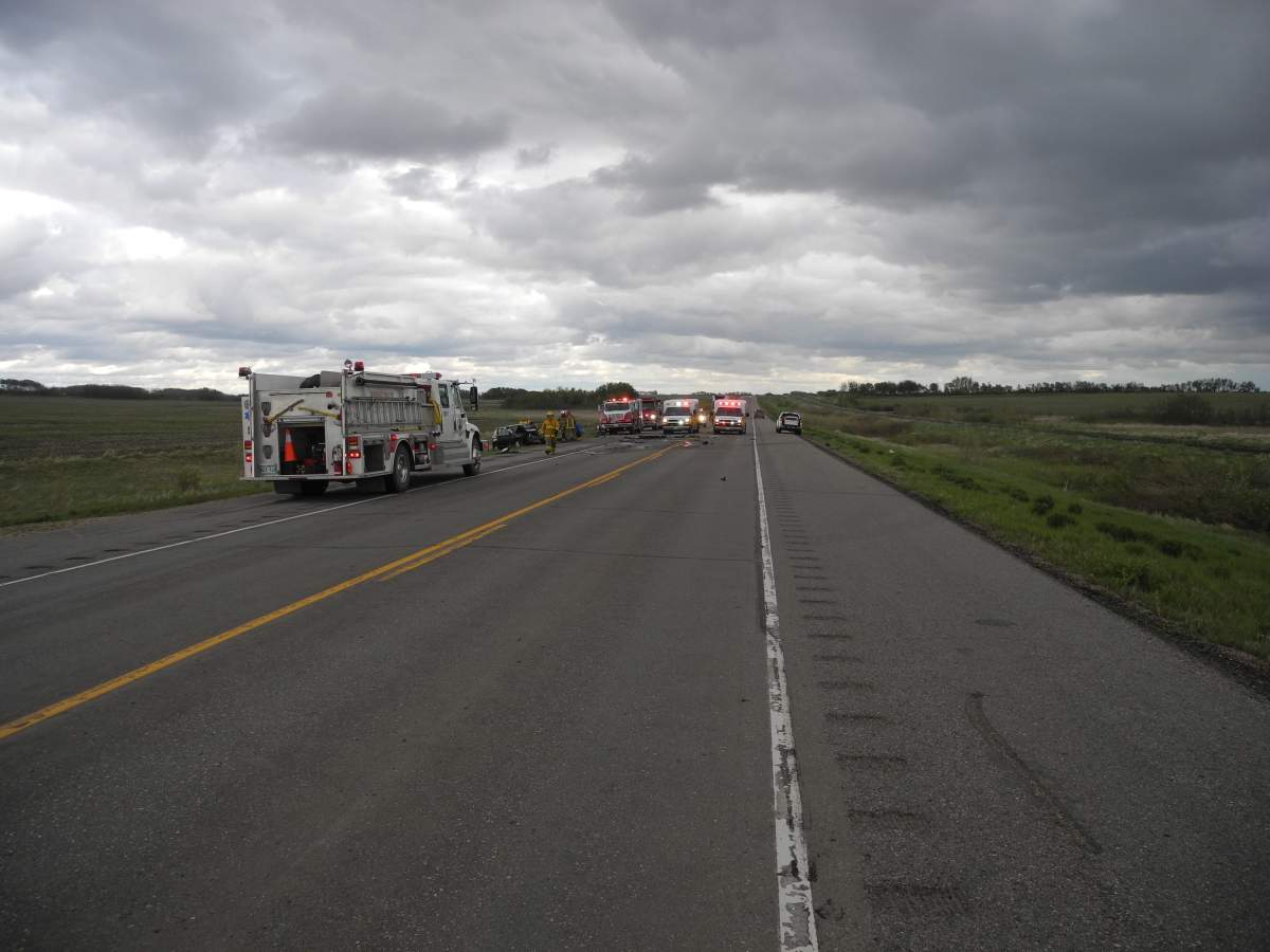 Emergency vehicles are seen blocking the road where Judy Lavallee was killed and Dawn Sabeski was seriously injured May 2017.