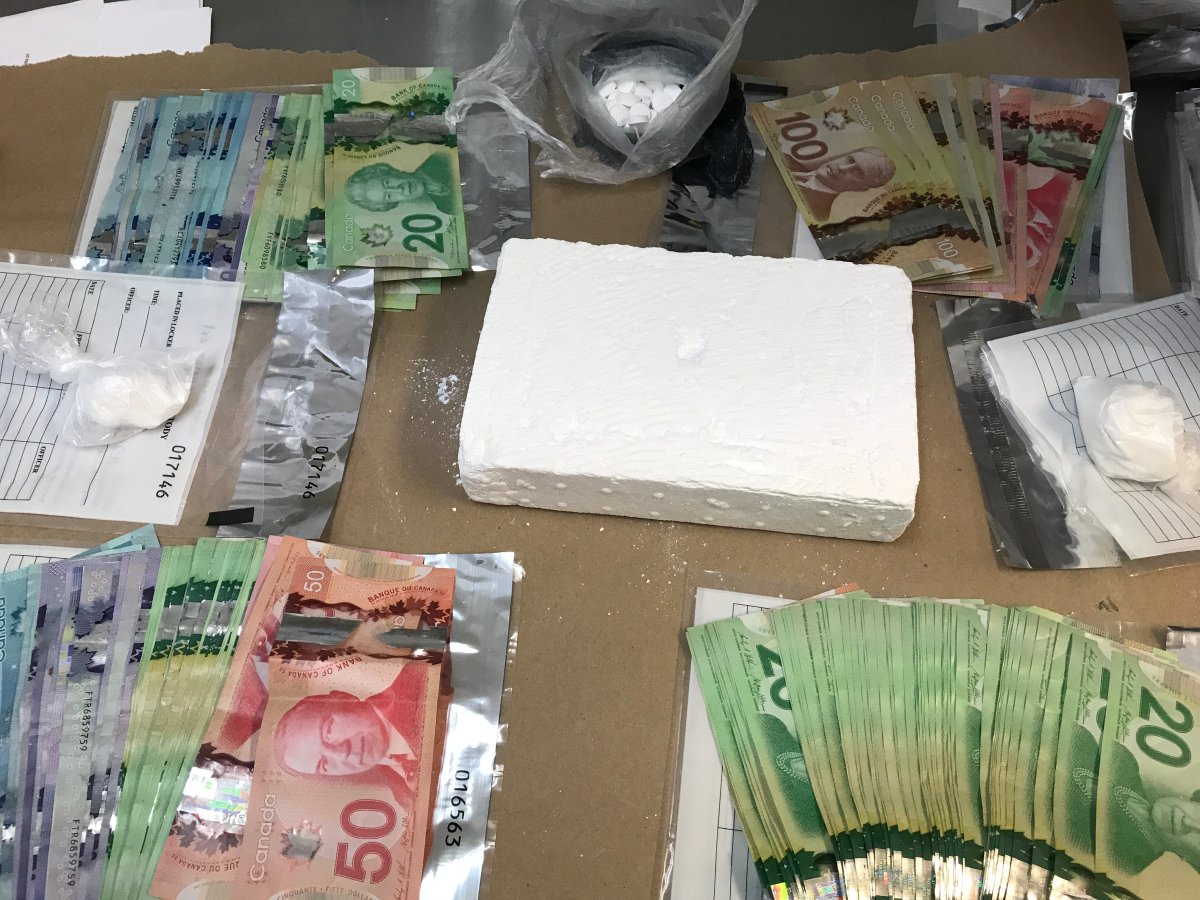 Guelph police say officers have seized one kilogram of cocaine and arrested two men from Waterloo region.
