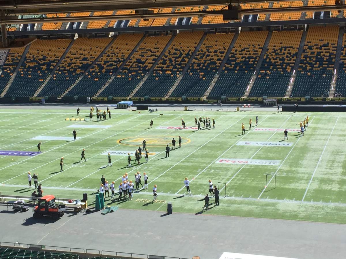 Eskimos open training camp on the Brick field at commonwealth Stadium.
