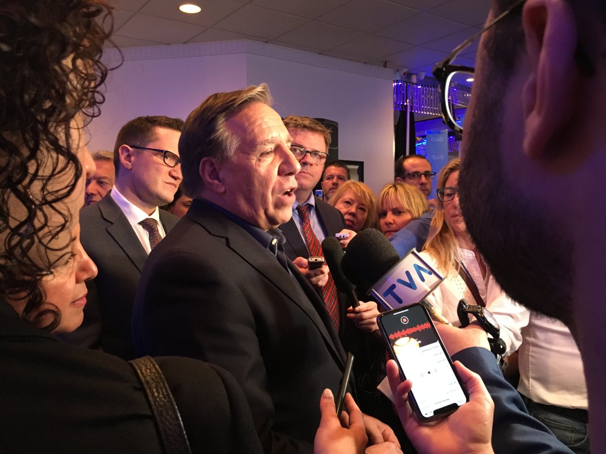 Premier François Legault speaks to reporters at the CAQ general council in Montreal on Sunday, May 26, 2019.