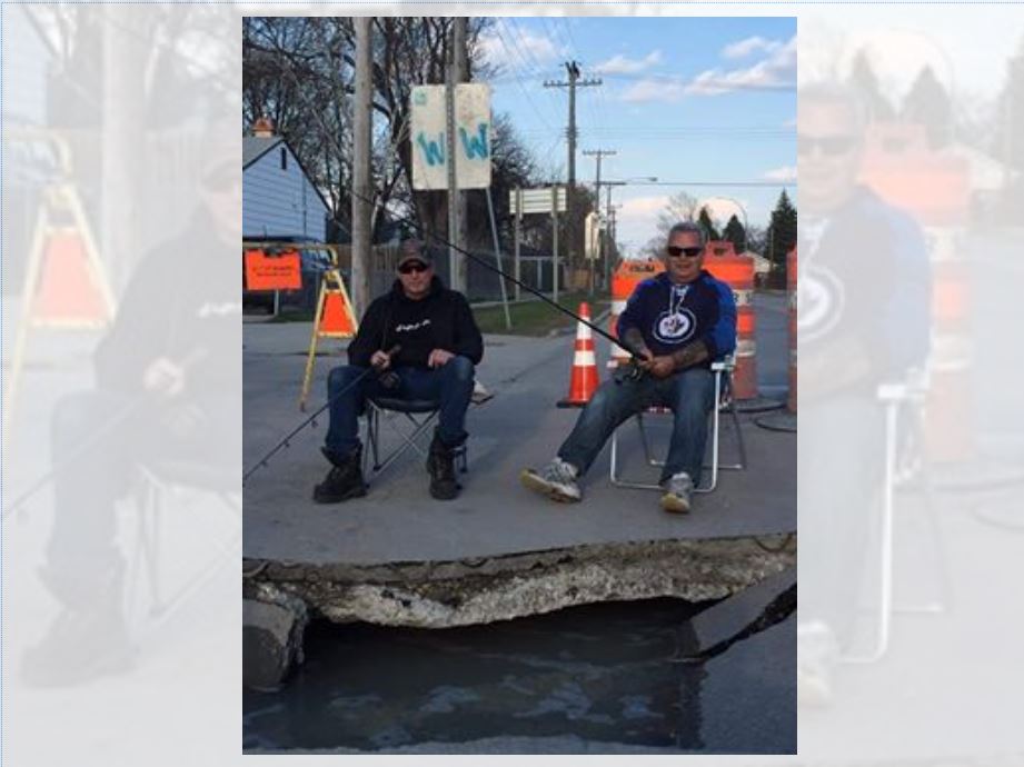 Joe Mcdougall and Shawn Pageot decided to make the best of a road hazard in Crestview, fishing for LochNESS monster.
