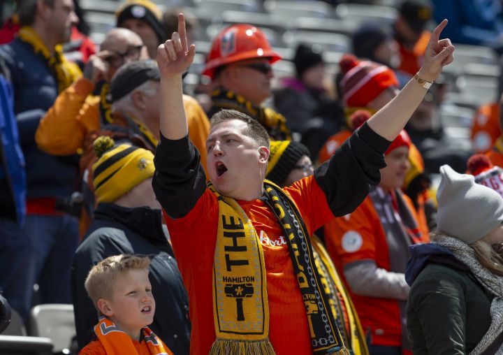 Forge FC fans chant and cheer during the inaugural soccer match of the Canadian Premier League between Forge FC of Hamilton and York 9 in Hamilton, Ont. Saturday, April 27, 2019. 