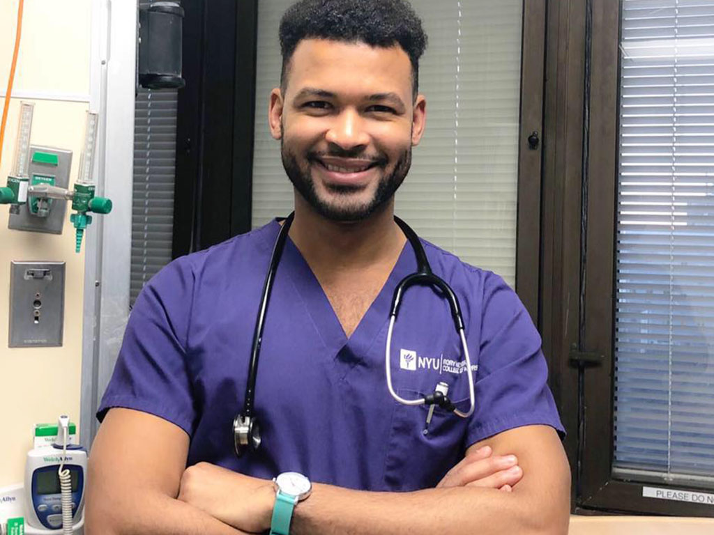 “While working [at NYU] with the nurses, I realized I wanted to be one of them,” Baez told CNN. (Frank Baez / Facebook)