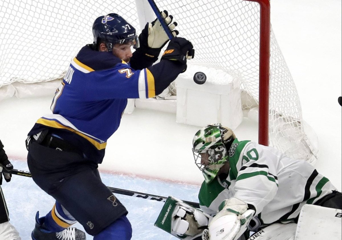 St. Louis Blues' Pat Maroon, left, celebrates after scoring against Dallas Stars goaltender Ben Bishop during the second overtime in Game 7 of an NHL second-round hockey playoff series Tuesday, May 7, 2019, in St. Louis. The Blues won 2-1 to take the series. (AP Photo/Jeff Roberson).