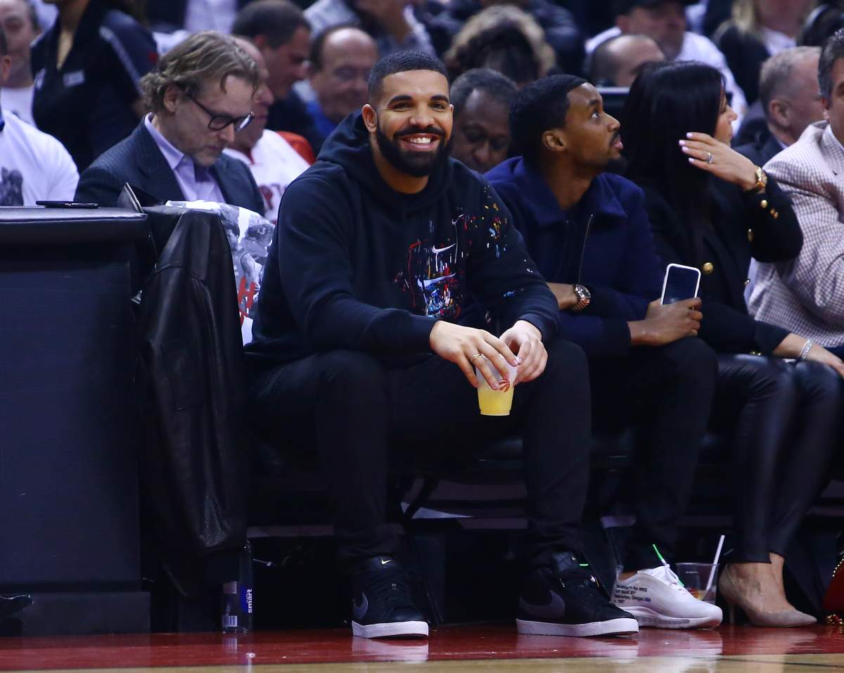 Drake looks on from his courtside seat during Game 2 of the second round of the 2019 NBA Playoffs between the Toronto Raptors and the Philadelphia 76ers at Scotiabank Arena on April 29, 2019 in Toronto.