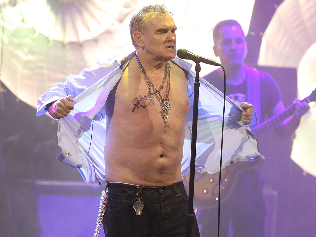 Morrissey rips off his shirt during the encore as he performs during his Broadway debut at Lunt-Fontanne Theatre on May 2, 2019 in New York City.