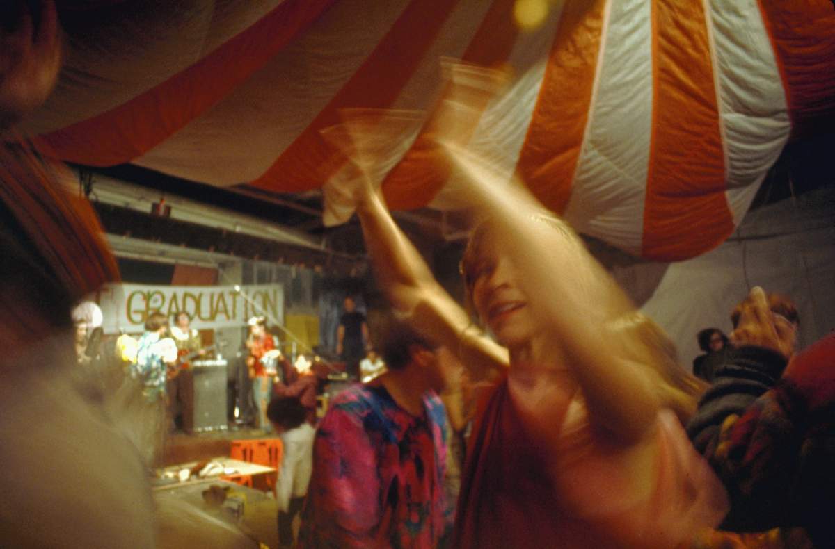 People dance at the ‘Acid Test Graduation,’ a celebration organized by Ken Kesey and his Merry Pranksters, in which participants graduated beyond acid. The Warehouse, Harriet Street, San Francisco, Calif.