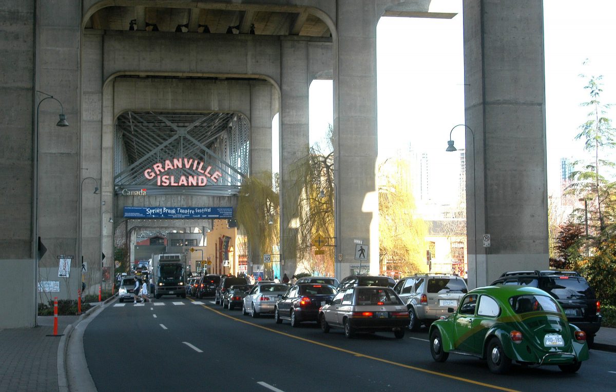 Traffic backs up at the south entrance to Granville Island in Vancouver, British Columbia March 13, 2004. 