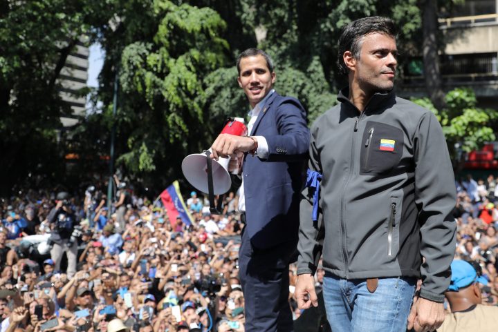 Venezuelan opposition leader Juan Guaido, who many nations have recognized as the country’s rightful interim ruler, and fellow opposition leader Leopoldo Lopez address a crowd of supporters in Caracas, Venezuela on April 30, 2019.