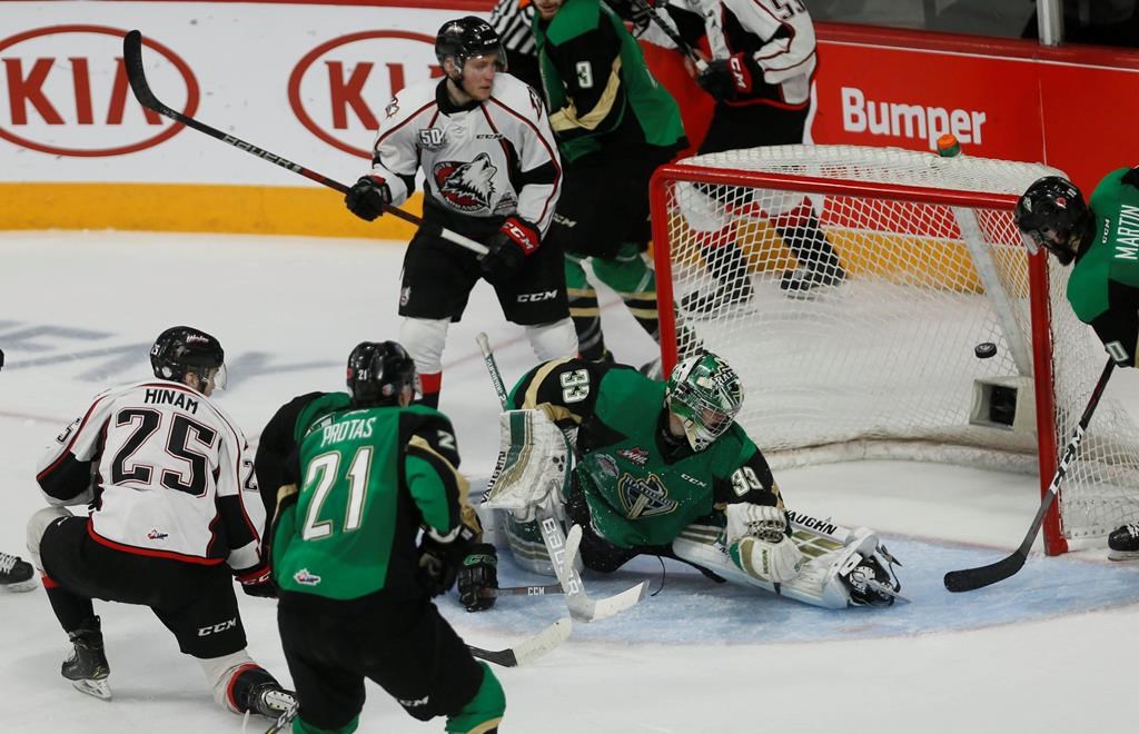 Rouyn-Noranda Huskies' Tyler Hinam, shoots the puck past Prince Albert Raiders goalie Ian Scott for the game-winning goal during Memorial Cup hockey action in Halifax, Monday, May 20, 2019.