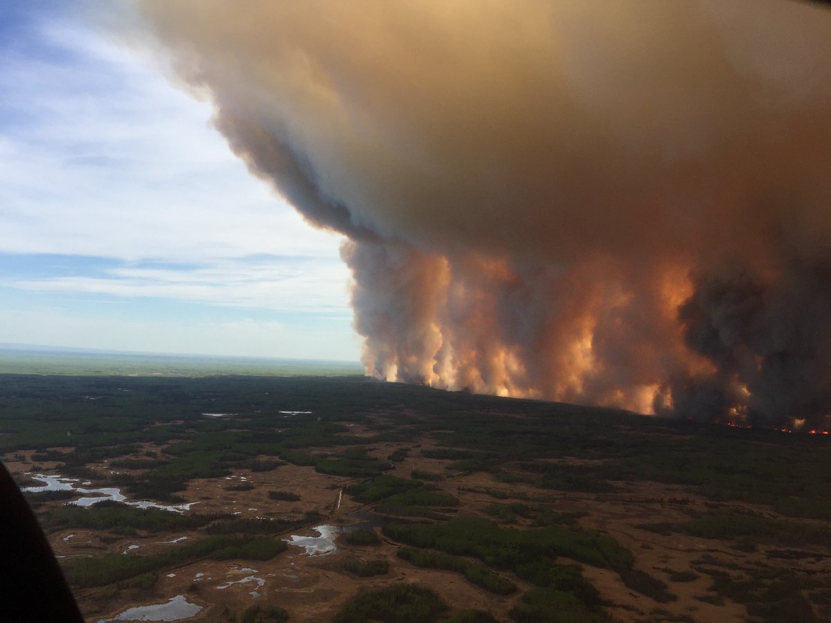 The Chuckegg Creek wildfire near High Level grew to over 23,000 hectares Sunday.