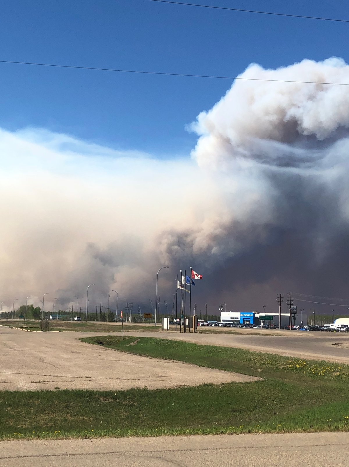 High Level, surrounding areas evacuated as wildfire burns in ...