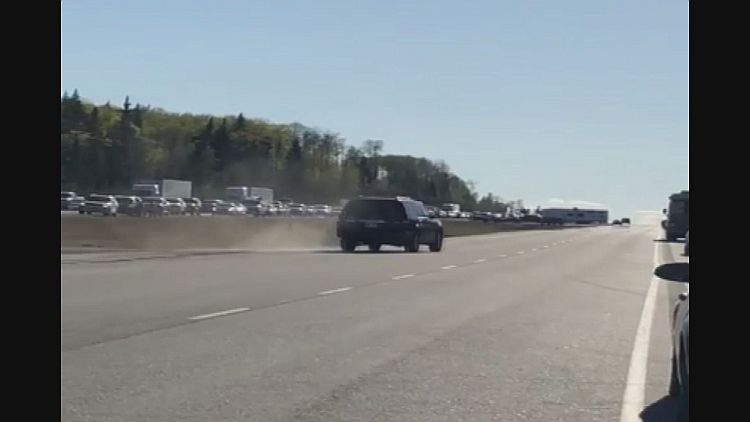 Traffic was backed up on Highway 16 near Edson on Sunday evening due to a wildfire.