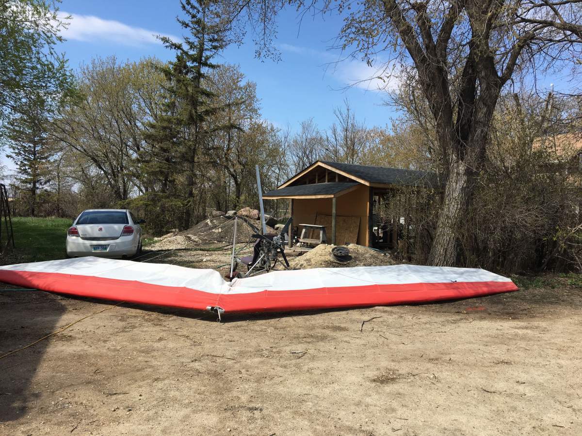 The ultralight aircraft after being removed from the tree.