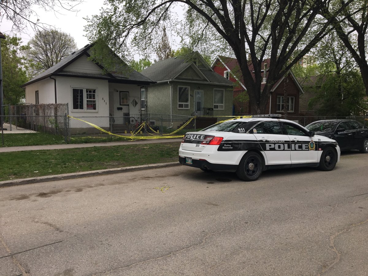 Winnipeg police at the scene of a homicide on Flora Avenue.