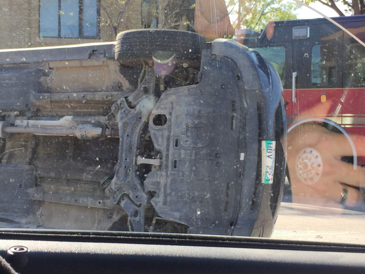 Car flips on Main Street near Mountain Avenue - image
