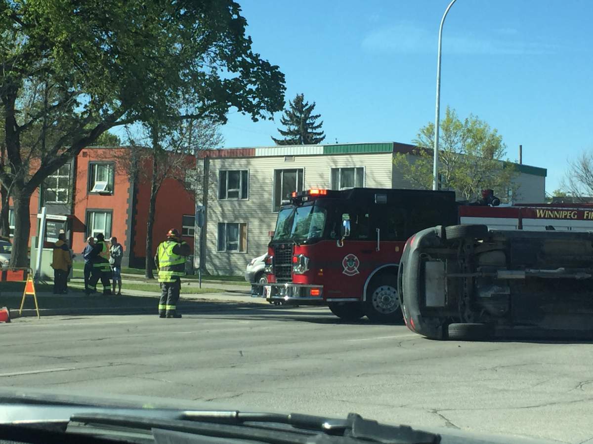 Car flips on Main Street near Mountain Avenue - image