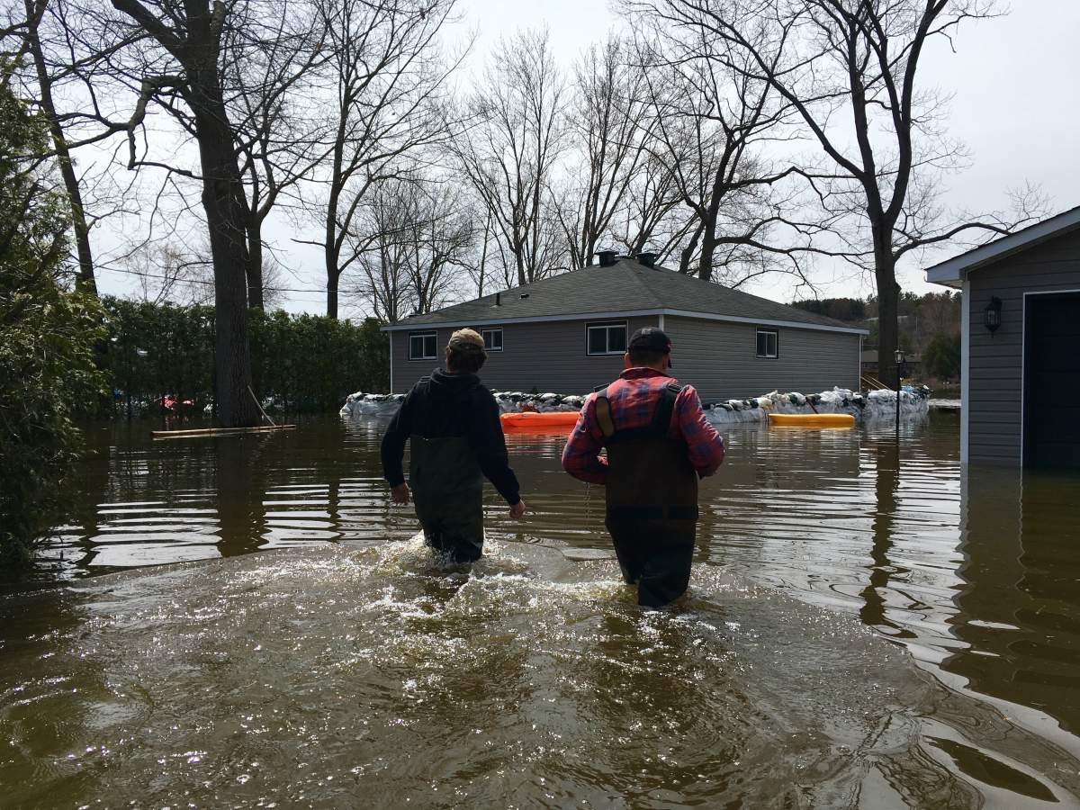 Ottawa resident Steven Wood (right) has been fighting to save his Constance Bay home from flooding. Image taken on Monday, April 29, 2019.