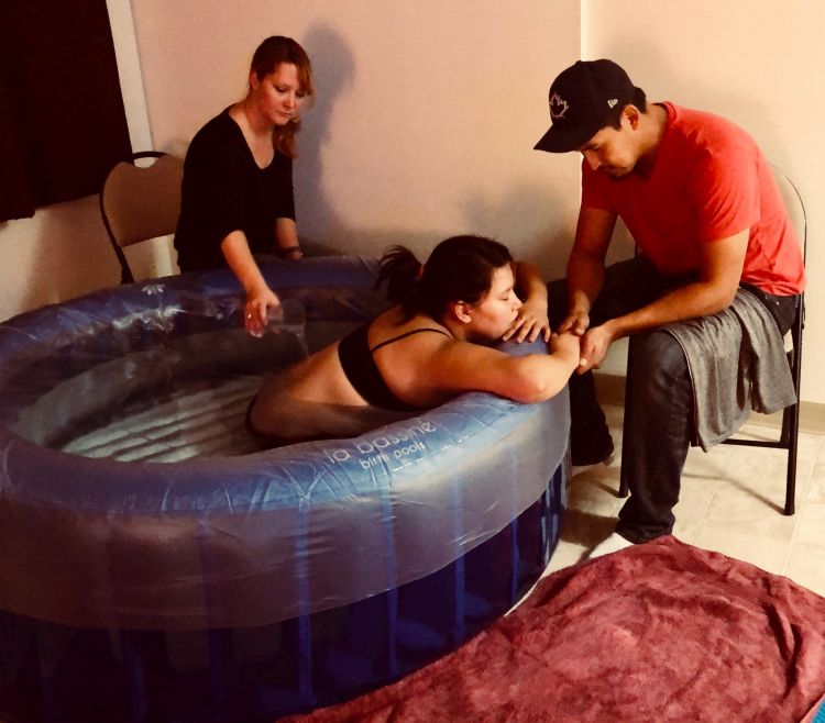 With the help of a midwife and surrounded by family, Freedom Bruce delivered her son at home, while incorporating Indigenous practices.