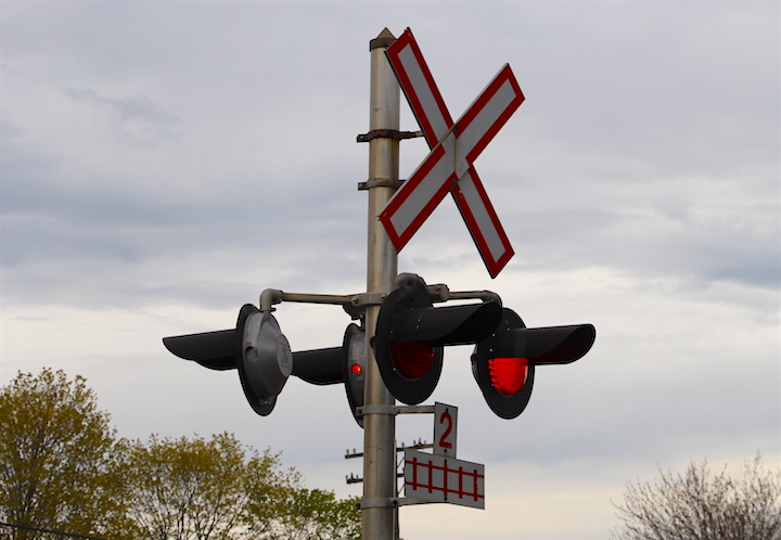 Railway crossing with flashing lights in file photo.