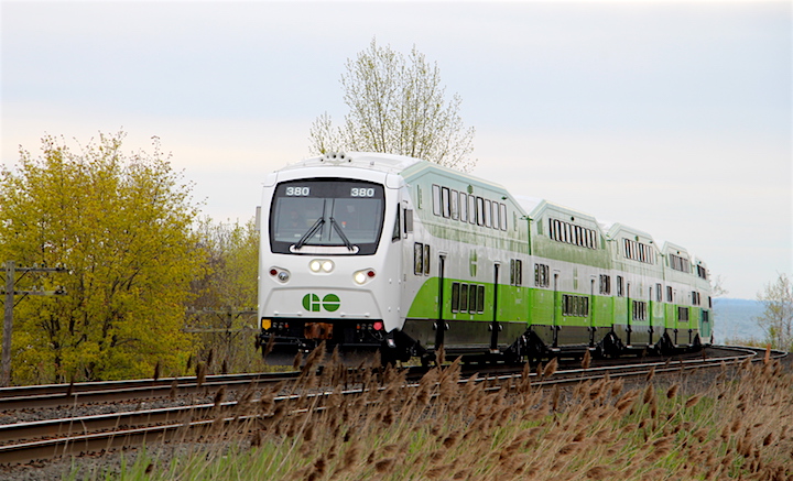 A GO Transit train travels along the Lakeshore line.