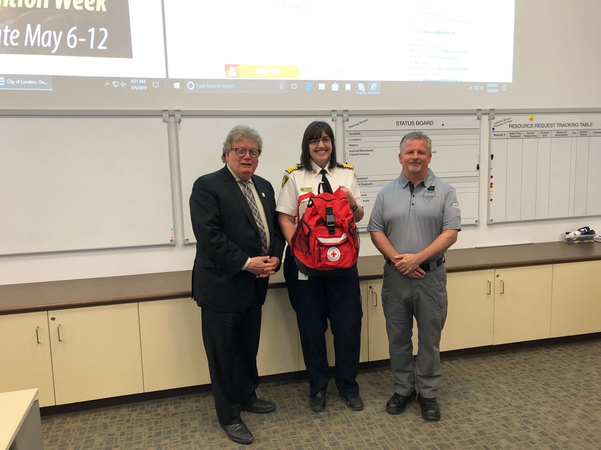 Mayor Ed Holder (left) poses with London fire Chief Lori Hammer and division manager for London's emergency management Dave O'Brien during the launch of a week dedicated to emergency preparedness, community safety and crime prevention.