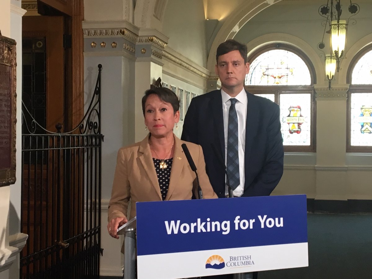 Advanced Education Minister Melanie Mark and Attorney General David Eby announce review of cash transactions for tuition. 