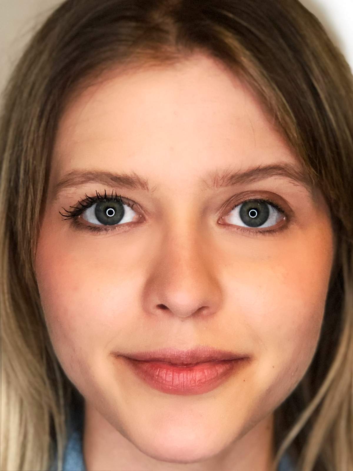 Laura Hensley with her winning mascara (on the left). Photo by Laura Whelan