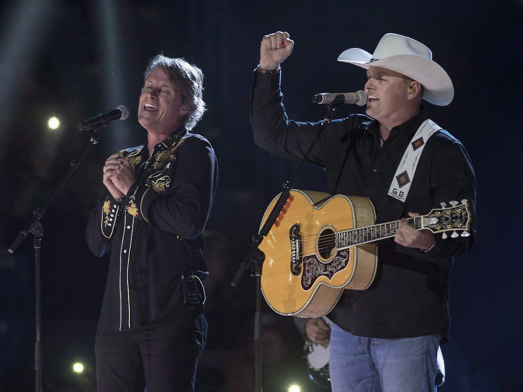 Jim Cuddy, left, and Gord Bamford perform at the Canadian Country Music Association Awards in Saskatoon on September 10, 2017. 