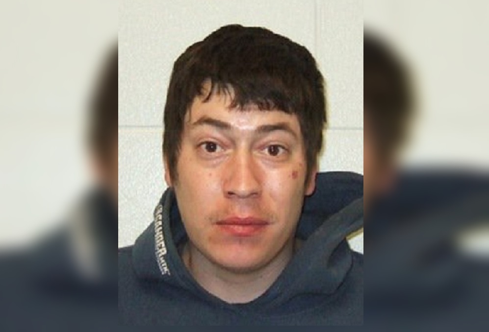 Waterloo Regional Police say John Hill is wanted in connection with an ATM theft investigation and is considered armed and dangerous.