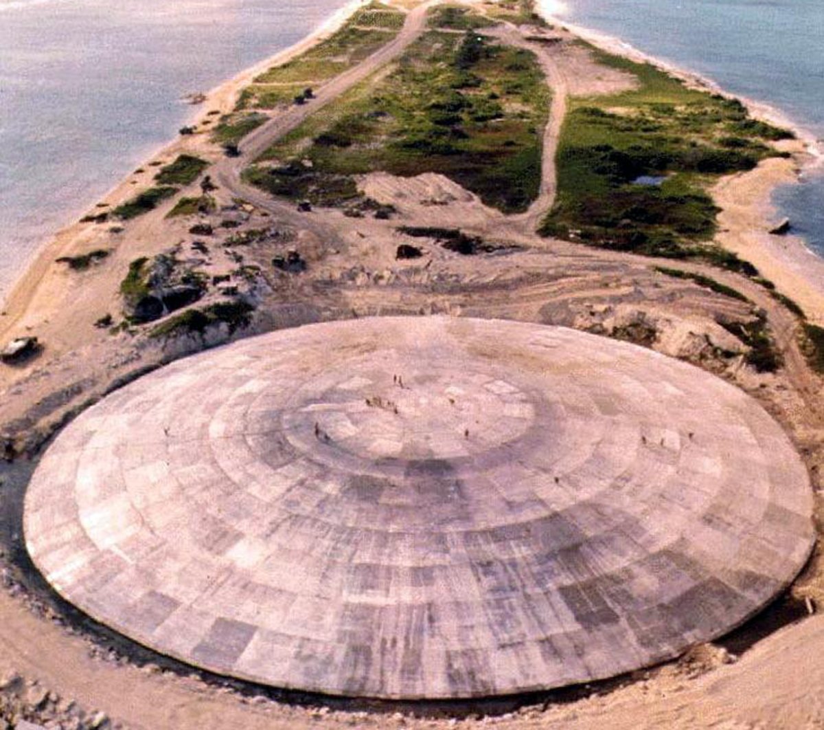 Picture taken by the U.S. Defense Nuclear Agency in 1980, shows the huge dome, which has just been completed over top of a crater left by one of the 43 nuclear blasts on the island, expected to last 25,000 years, capping off radioactive debris from nuclear tests over Runit Island in Enewetak in the Marshall Islands. 