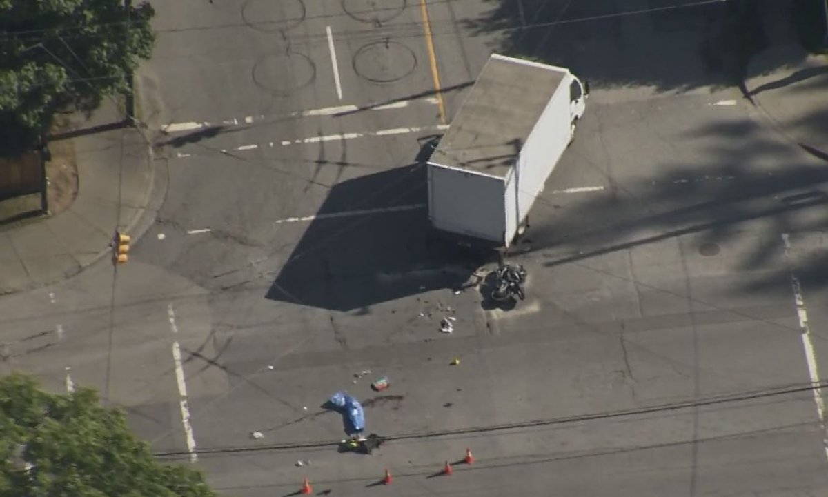 The scene of a collision between a motorcycle and a truck in a West Point Grey intersection Thursday, May 23, 2019.
