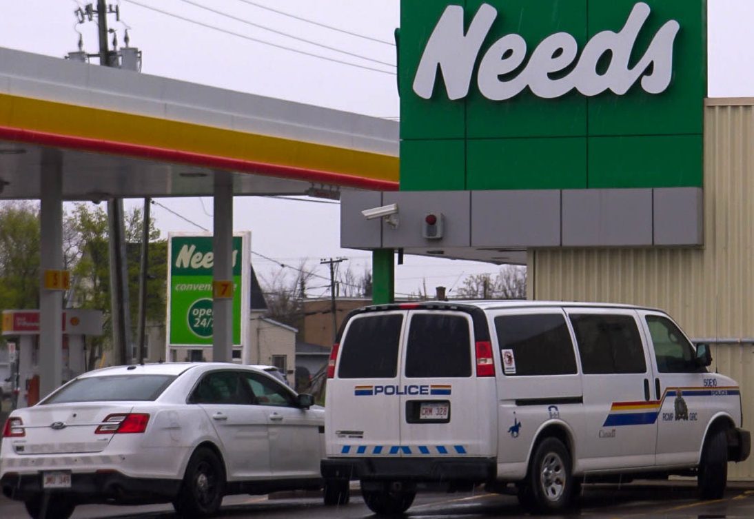 RCMP vehicles can be seen outside the Needs Convenience store on Mountain Road in Moncton on May 26, 2019.