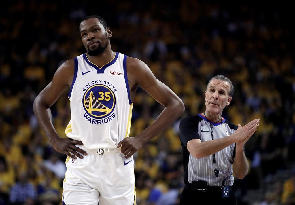 Golden State Warriors’ Kevin Durant, left, walks away from referee Ken Mauer during the first half of Game 5 of the team’s second-round NBA basketball playoff series against the Houston Rockets in Oakland, Calif. (AP Photo/Ben Margot, File)