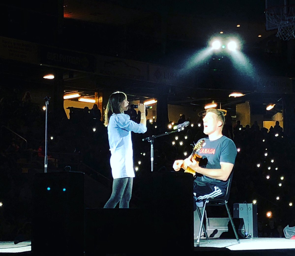 Patrick Anderson sings a song with his wife at Empowerment Day at the Sleeman Centre on Thursday.
